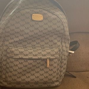 A Women Michael kors backpack